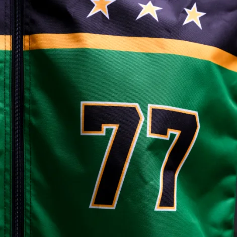 Close-up of custom number 77 stitching